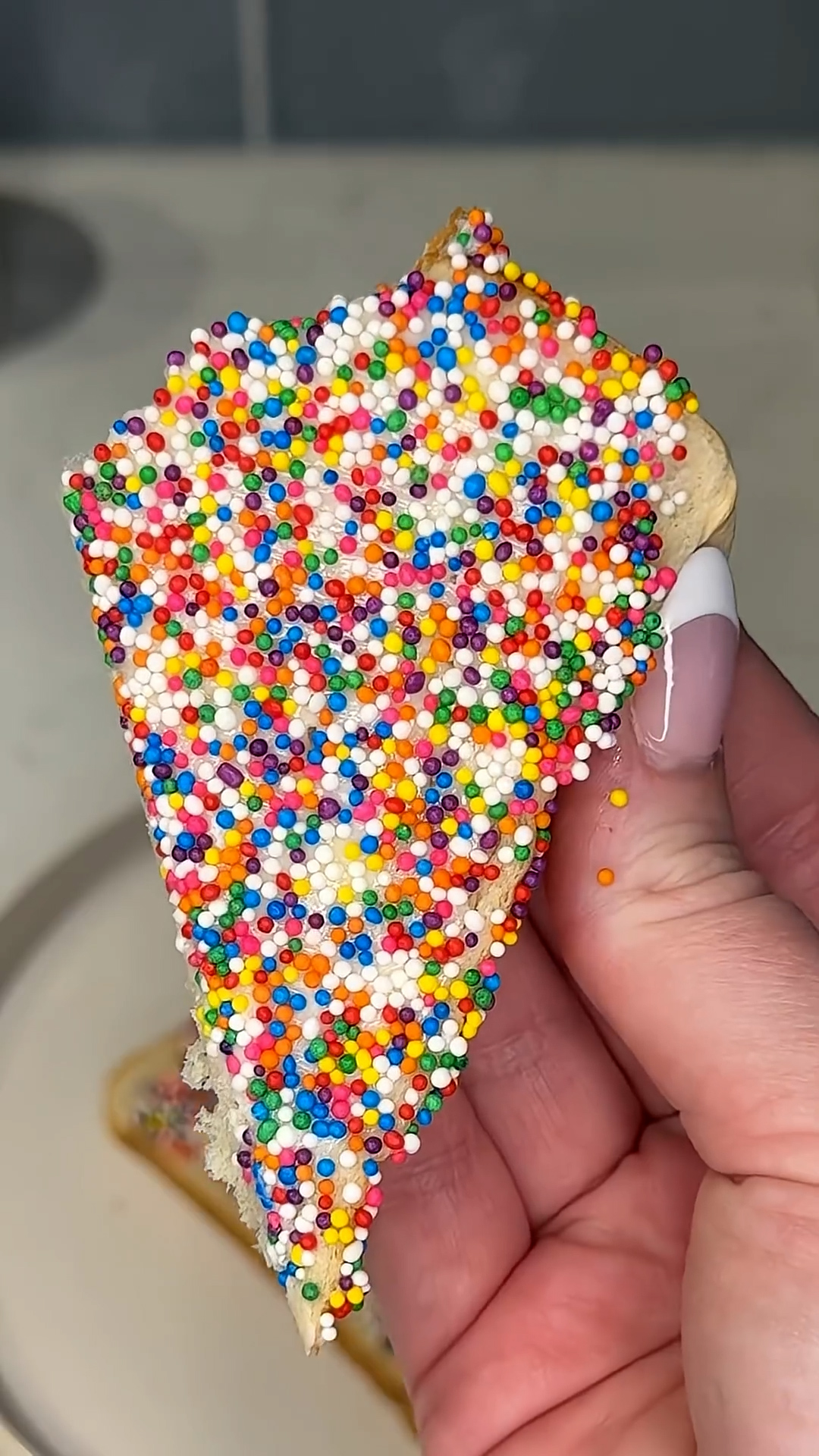 Rainbow sprinkle-covered bread becomes nostalgic sweet treat
