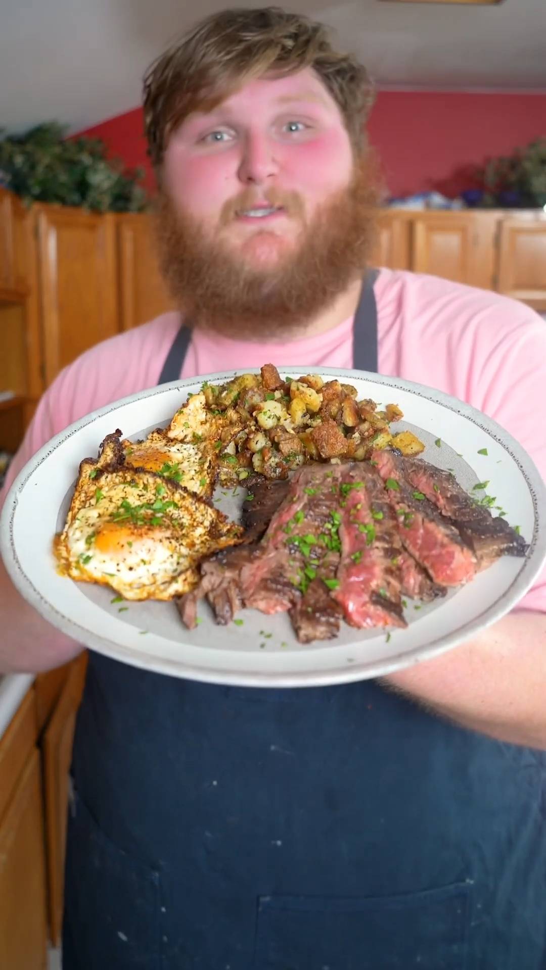 Indulgent steak and eggs breakfast with crispy potatoes and roasted garlic