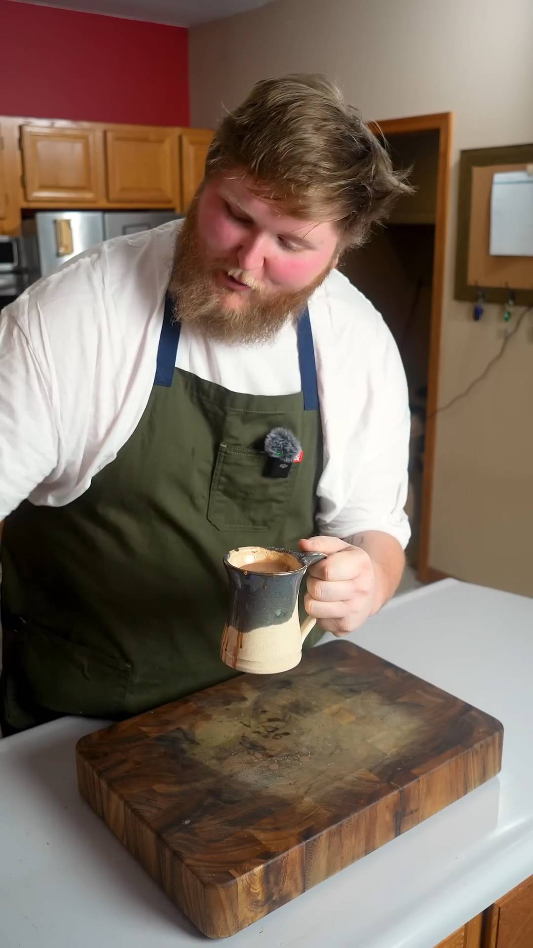 Thick homemade hot chocolate topped with marshmallows and cocoa