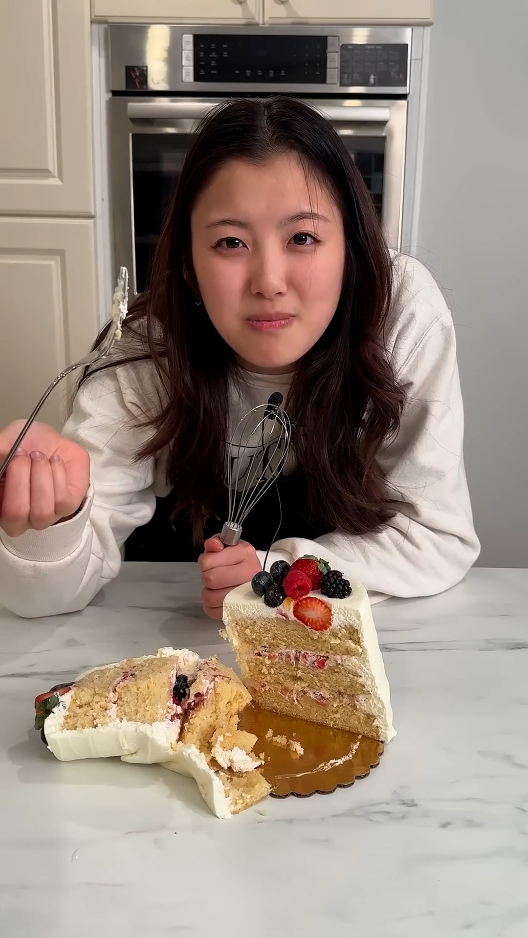 Trying the iconic berry chantilly cake from Whole Foods