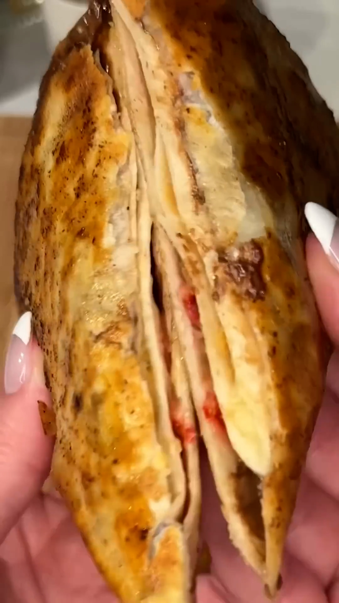 Flatbread filled with fresh fruit and chocolate for sweet wrap