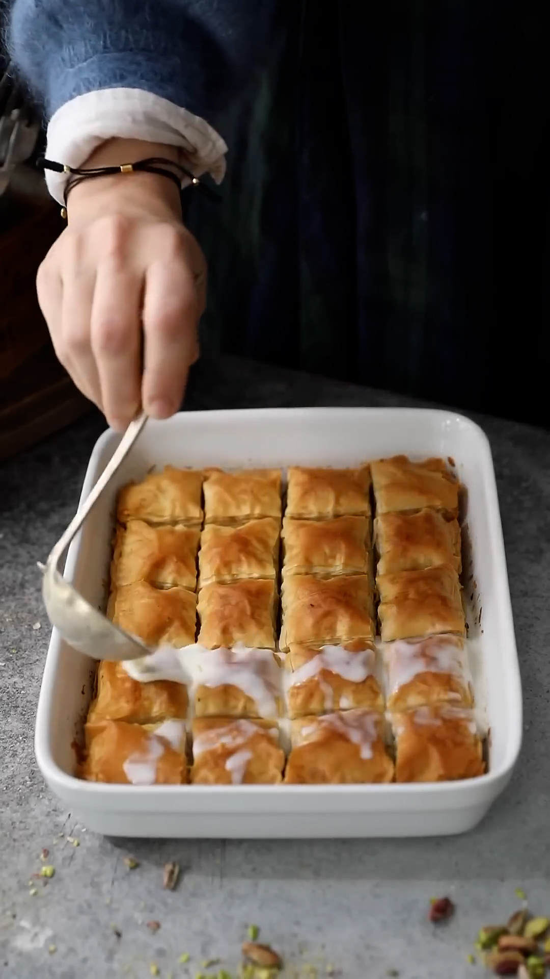 Refrigerated nut-filled pastry drizzled with syrup