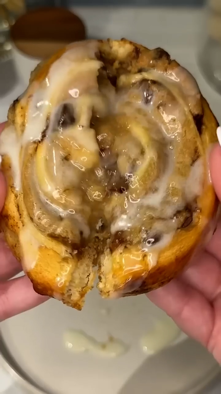 Cookie dough swirled into breakfast pastry creates hybrid treat