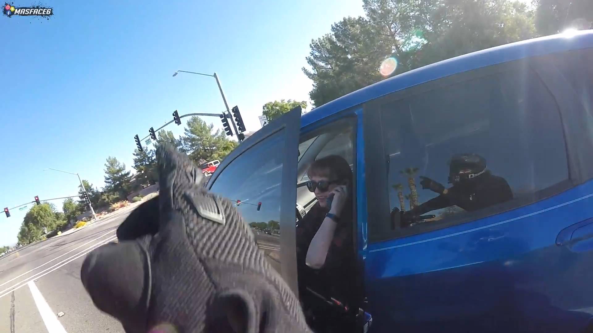 Biker pushed a car off the road