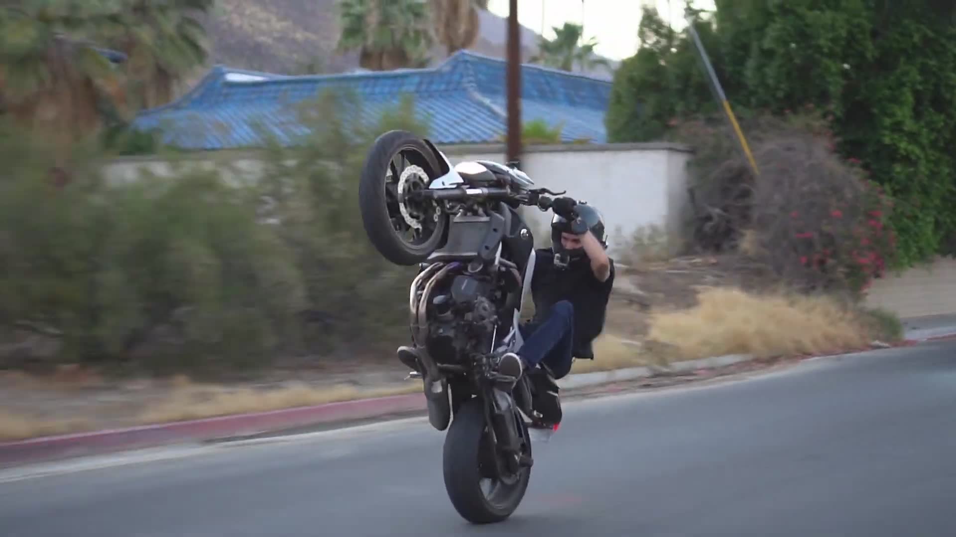 How to wheelie standing on your seat